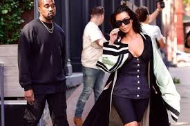 Orange track jacket and pants. 5 Ridiculous Outfits Kim Kardashian Wore In 2016 Ewmoda