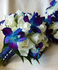 … bridal bouquet includes bom blue dendrobium orchids, white lilies, white calla lilies, spray roses and italian ruscus designed by flower girlz inc., fort walton beach, fl. Pin By Olga Ayala On Wedding Ideas Wedding Flowers Bridal Bouquet Wedding Bouquets