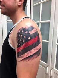 American flag tattoo designs for women contain roses colored like the flag. Flag Tattoo Designs Show Your Colors