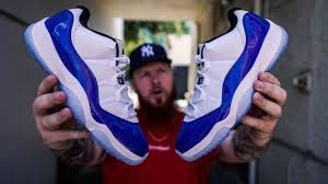 A white midsole, red translucent outsole, and jordan branding on the tongue complete the design. How Good Are Jordan 11 Low White Concord Sneakers Early In Hand Review Youtube