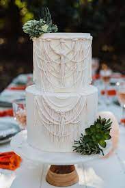 For The Most Part Wedding Cakes Are Layered Or Multi Layered And Are Heftily Decorated With Icing Bead Bohemian Wedding Cake Boho Wedding Cake Desert Wedding