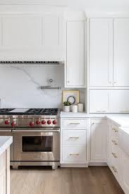 Wolf Range With Honed White Marble Slab Backsplash Transitional Kitchen In 2020 Kitchen Cooktop Wooden Range Hood Kitchen Range Hood