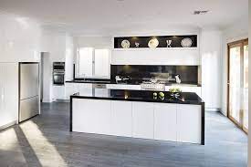 The colour black has many virtues. Designer Kitchens Gallery Rosemount Kitchens Kitchen Gallery Black Kitchens Kitchen Flooring White Kitchen Island