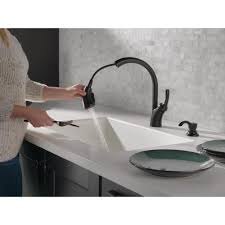 In this video, we're replacing a two handle kitchen faucet. Delta Shiloh Single Handle Pull Out Sprayer Kitchen Faucet With Shieldspray In Matte Black 19790z Blsd Dst The Home Depot Kitchen Faucet Faucet Single Handle Kitchen Faucet