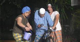 (the dialect used by the. Zombi Kampung Pisang