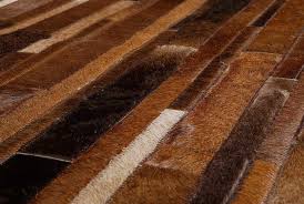 Discover exactly how to do it yourself! Cleaning Leather Rugs How To Care For And Clean Cowhide Rugs Other Animal Skin Rugs The Log Homes Guide