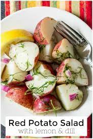 The Perfect Dish To Bring To A Summer Party The Bright Red Potato Salad With Fresh Lemon Juice And Dill Straight Red Potatoes Yummy Side Dish Red Potato Salad
