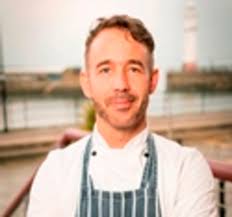 Pimentón, lemon and chilli risotto with mussels, cockles and kale