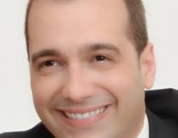 Desgaste das superfícies deslizantes na substituição total da articulação  temporomandibular: estudo in vitro