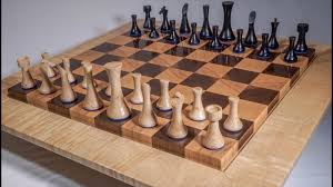 The frame, once assembled, is attached to the bottom of the table top. Woodturning A Modern Chess Set Youtube