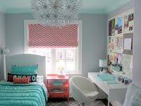 Simply paint your thrifted frames in a single unifying color, and string picture wire across the back. Small Teen Room