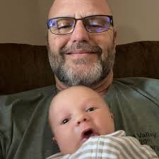 Magician Joe Burrus is lowered to a “grave” in a casket as he prepares to  perform a stunt. Burrus passed away after the casket collapsed under the  weight of the concrete poured