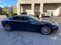 Image result for Midnight Blue 2012 Aston Martin