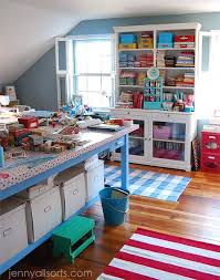 The stone buffet counter doubles as a durable workspace while a tall swivel chair can be used as a crafting chair or extra dining room seating. Allsorts Studio Craft Room Quilting Room Sewing Room Inspiration