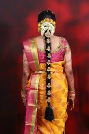 Bridal Hair Do And Blouse Design For Tamil Wedding Mugurtham Indian Bridal Hairstyles Bridal Hairstyle Indian Wedding Indian Bride Hairstyle