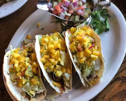 Ordered 2 speciality tacos, the pesce (fish) and surf and turf (skirt steak and shrimp). Fish Tacos Delivery In Coram Postmates