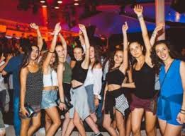 At the trendy alemagou beach bar and restaurant, champagne is already flowing and a german bachelorette party is underway. Mykonos Party Mykonos All Day Night Fun Mykonos Beach Clubs