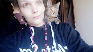 Lost brown/grey tabby cat with orange spots