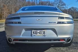 Image result for Lightning Silver 2011 Aston Martin