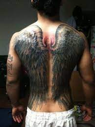 Photo tattoo feminin plume ailes d ange dos. Ben Henderson S Angel Wings Tattoo Tatouage Ailes Tatouage Dos Homme Tendances Tatouages