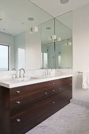 I need a medicine cabinet in my tiny bathroom, but if i add a second bath, i plan to do a big round mirror (over a single vanity because i live in a small space). Bathroom Mirror Ideas Fill The Whole Wall