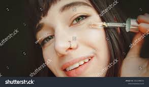 Attractive Brunette Nose Piercing Applies Serum Stock Photo 2311298521 |  Shutterstock