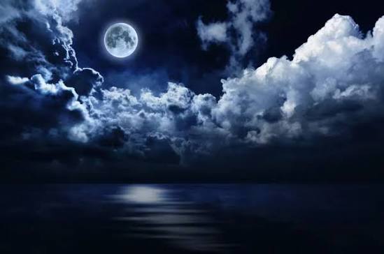 Full moon in night sky over water - Stock Image - Everypixel