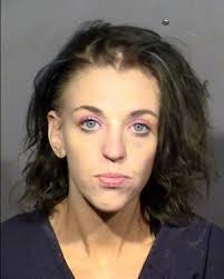 Report: Las Vegas woman threatened gas station employee with 'KKK friends,'  knife