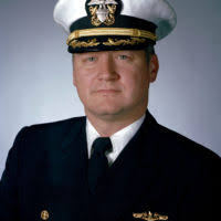 Commander Phillip George Corrigan, USN (covered)