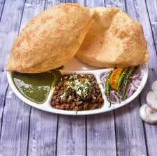 It is made with chickpeas, and a delicious fried bread. Dilli Wale Chole Bhature Point Home Delivery Order Online College Road Bombay Naka Nashik