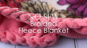 This style uses a knot that shows the coordinating fabric, making a great contrast. No Sew Fleece Blanket With A Braided Edge Youtube