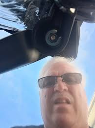 Should I tighten the nut myself or send it back to the dealer?