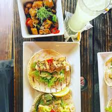 Small size flour tortillas, heated up in oven on top of actual dinner (lime chicken). La Cambija Restaurant Serves Up The Best Pinchos In Rincon Puerto Rico Here Magazine Away