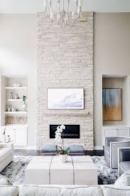 Whitewashing your fireplace will freshen up your entire living room, so get to work. 26 Stone Fireplaces For Ultimate Coziness Digsdigs