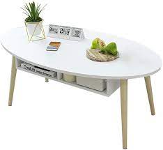 Reflecting a seamless organic shape and timeless form, the lippa coffee table has become a symbol of modernism for over the past 60 years. Saladplates Lxm Oval Coffee Table End Table Side Table With Drawer White Amazon Co Uk Home Kitchen
