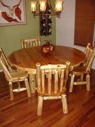 Our big woods log dining tables are perfect for homes, cabins and lodges because of their rustic good looks, quality and flexibility in sizes. Round Cedar Wooden Log Table For 4 Vienna Woodworks