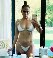 For the entire week my facebook timeline has been flooded with pictures and memes of jennifer lopez's halftime performance at the super bowl liv and her ability to do such at the age of 50. Jennifer Lopez Sets The Internet On Fire Flaunting Her Toned Body In A White Bikini Bollywood News Bollywood Hungama