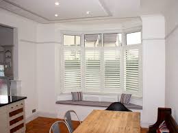 × 6 + max adults: Kitchen Bay Window Shutters With Window Seat Bournemouth Contemporary Dorset By The Shuttershack Uk