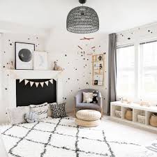 The simple little couch is surrounded by big fluffy poofs and pillows that are perfect for nap and quiet time. 21 Fun Kids Playroom Toy Room Ideas