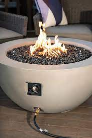 Convertible to natural gas (orifice included) uses standard 9.1 kg (20 lb.) propane tank (not included) Costco Is Selling A Gas Fire Pit To Take Your Patio To The Next Level