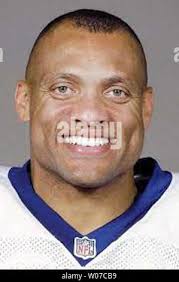 St. Louis Rams' Aeneas Williams tackles Arizona Cardinals' Bryan Gilmore.  The Rams defeated the Cardinals in overtime 30-27, Nov.23, 2003 at Sun  Devil Stadium in Tempe, Arizona. (UPI Photo/Will Powers Stock Photo -