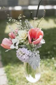 Maybe you would like to learn more about one of these? Love The Fresh Flowers In This Aisle Marker Amy Watson Photography Wedding Flowers Tulips Tulip Wedding May Weddings