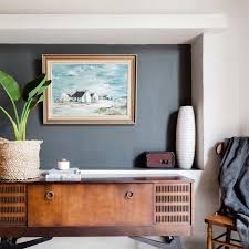 Using a dark blue — similar to pam's 2012 color of the year, bitossi blue — for the wall will make robert's bedroom feel cozy and act as a striking backdrop to the blond furniture in the room. 5 Ways To Decorate With Charcoal Gray