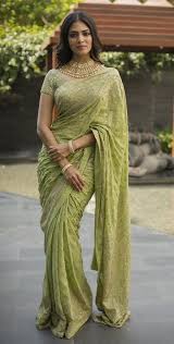 She is looking damn cool in the sandal and red shade saree. 50 Hot Pictures Of South Indian Heroines In Saree 2021