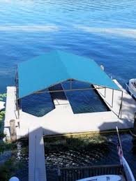Keep your boat tied to the dock while you warm up the engine. 22 Dock Slip Covers Ideas Dock Boat Dock Residential Awnings