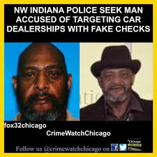 Paul Modrowski is led from the Barrington Police Department by detectives  Kevin Croke, left, and Ray Peters