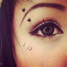 Eyebrow And Below The Eye Face Piercings Eyebrow Piercing Facial Piercings