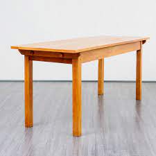 The elegant turnings add a delicate quality to the piece, while the bottom block ensures the strength and stability of the table leg. German Tavern Dining Table In Solid Wood 1950s 102073