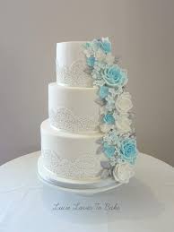 Elegant Lace Flower Cascade Wedding Cake In Blue White And Silver Tones Wedding Cake Created Wedding Cake Fresh Flowers Lace Wedding Cake Cool Wedding Cakes