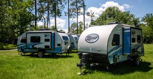 Purchasing a pull behind camper provides a home while travelling for a camping getaway. Forget Big Trucks Four Compact Rvs That Can Be Towed With A Car Or Suv